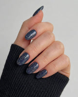 Glitter Glitz Navy nail art close-up showing deep blue cat eye glitter nails details