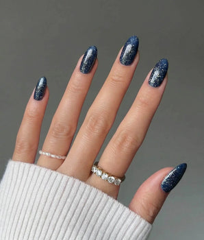 Glitter Glitz Navy handmade press-on nails featuring deep blue cat eye glitter nails