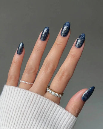 Glitter Glitz Navy handmade press-on nails featuring deep blue cat eye glitter nails