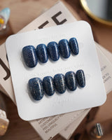 Glitter Glitz Navy press-on nail set — deep blue cat eye glitter nails design, hand-painted with real gel polish