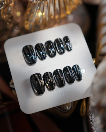 Glitter Logic·Black nails in short oval — Obsidian Black & Aurora