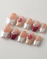 Duchess Purple glossy purple nails with blooming flower accents and feminine spring detail