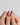 Glossy red lily nails with 3D sculpted petals