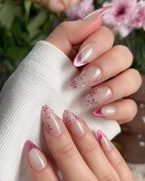 Glow Garden nail art close-up showing Magenta Cat Eye, French Tips & Hand-painted Florals. details