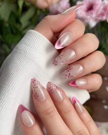 Glow Garden nail art close-up showing Magenta Cat Eye, French Tips & Hand-painted Florals. details