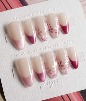 Glow Garden handmade press-on nails featuring Magenta Cat Eye, French Tips & Hand-painted Florals.