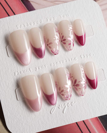 Glow Garden handmade press-on nails featuring Magenta Cat Eye, French Tips & Hand-painted Florals.