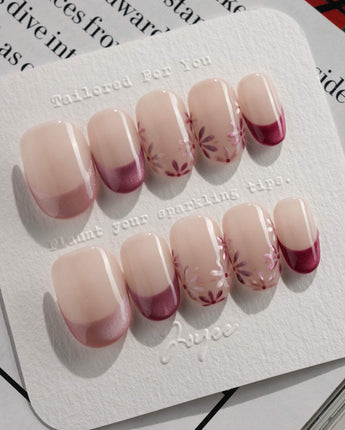 Glow Garden press-on nails in short oval shape — Magenta Cat Eye, French Tips & Hand-painted Florals.