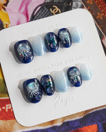 Glow Jellyfish Nails extra short oval nails with soft ethereal jellyfish accents