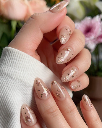 Glow Petals press-on nails — Gentle Nude Pink, Rose Gold Flowers & Gold Flakes. handmade nail art by Joyee Nails