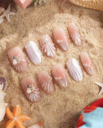 Glow Shore nail art close-up showing Nude Pink Ocean Style, 3D Shells, Starfish & Pearls. details