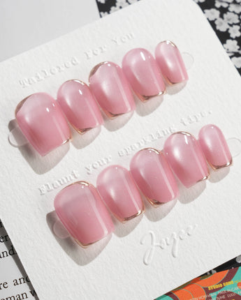 Glowing Stone - New Edition press-on nails in extra short coffin shape — Gentle Rose Cat Eye, Simple Silver Outlines.