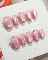 Glowing Stone - New Edition press-on nails in extra short oval shape — Gentle Rose Cat Eye, Simple Silver Outlines.