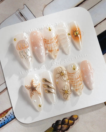Golden Bay press-on nails — Pearly Milky White, 3D Shells & Gold Wire Florals. handmade nail art by Joyee Nails