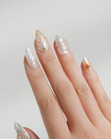 Golden Bay five-star resort nails with milky shimmer and sculpted gold details