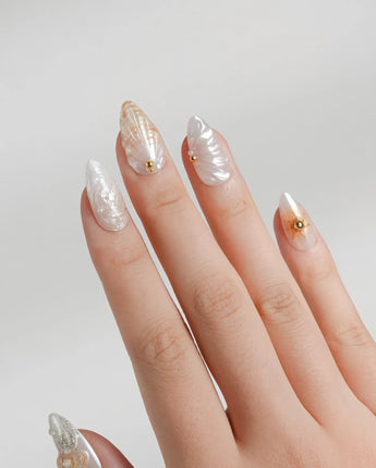 Golden Bay five-star resort nails with milky shimmer and sculpted gold details