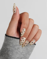 Golden Dot custom-size nails with hand-applied gold chrome dots and wearable nude base