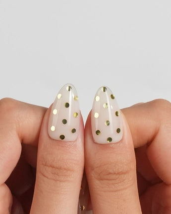 Golden Dot gold foil polka dot nails with high-gloss cream nude gel