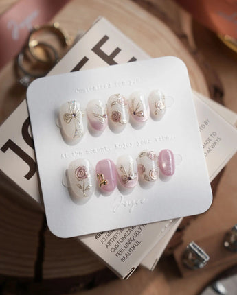 Golden Hour press-on nails in extra short oval shape — Romantic Dusty Pink Gradient, 3D Metallic Roses & Silver Ribbon.