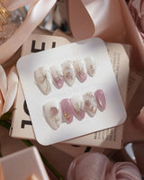 Golden Hour handmade press-on nails featuring Romantic Dusty Pink Gradient, 3D Metallic Roses & Silver Ribbon.