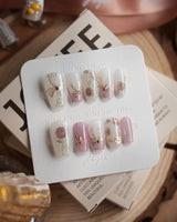 Golden Hour press-on nails in short coffin shape — Romantic Dusty Pink Gradient, 3D Metallic Roses & Silver Ribbon.