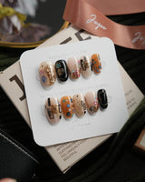 Golden Kiss short oval press-on nails