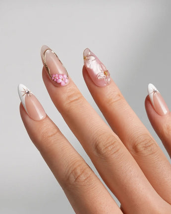 Golden Tide wedding-ready French manicure with sculpted flowers and glossy nude base