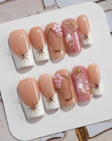 Golden Tide gold French tip floral press-on nails in medium square shape