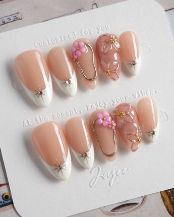 Golden Tide gold French tip floral press-on nails in short almond shape