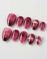 Gone with the Wind extra short almond press-on nails with burgundy marble and gold foil
