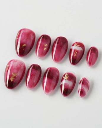 Gone with the Wind extra short almond press-on nails with burgundy marble and gold foil
