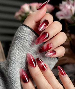 Gone with the Wind press-on nails with burgundy marble, gold foil and glossy gel finish