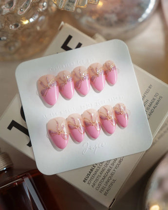 Gorg Bow nails in extra short almond — Sweet Barbie Pink, Golden