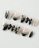 Gorgeous Gown press-on nails in extra short oval shape — black white gradient rhinestone bow y2k nails