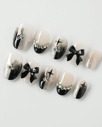 Gorgeous Gown press-on nails in extra short oval shape — black white gradient rhinestone bow y2k nails