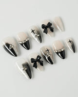 Gorgeous Gown press-on nails in short stiletto shape — black white gradient rhinestone bow y2k nails
