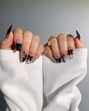 Gorgeous Gown handmade press-on nails featuring black white gradient rhinestone bow y2k nails