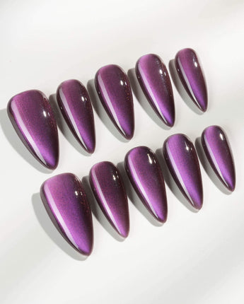 Grape Color Cat-eye press-on nails in medium stiletto shape — purple cat eye nails