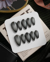 Graphite press on nails in smoky grey glossy jelly with a hand-drawn silver chrome outline - image 2
