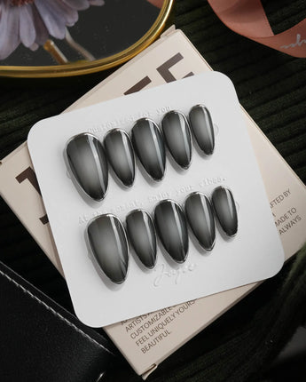 Graphite press on nails in smoky grey glossy jelly with a hand-drawn silver chrome outline - image 2