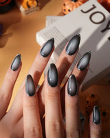 Graphite press on nails in smoky grey glossy jelly with a hand-drawn silver chrome outline - image 3