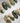 Green Christmas press-on nails with bow and snowflake details