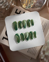 Green Ribbons nails in extra short almond — Mori Dark Green &