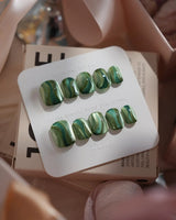 Green Ribbons nails in extra short squoval — Mori Dark Green &