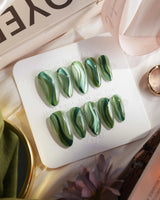 Green Ribbons nails in medium almond — Mori Dark Green &