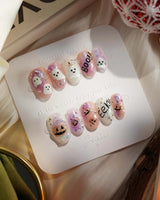Hallow’s Eve nails — sheer pink base iridescent by Joyee Nails