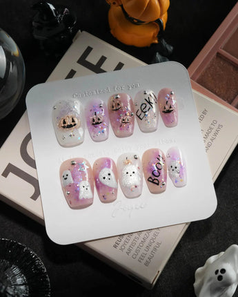 Hallow’s Eve handmade press-on nails in short coffin shape by Joyee Nails