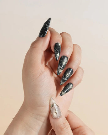 Halo Prophecy nails in medium stiletto — Champagne Gold & Phantom