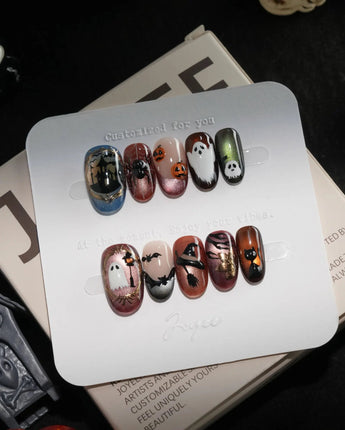 Haunted Manor handmade press-on nails in short oval shape by Joyee Nails