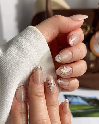 Haze Bloom press-on nails — Elegant Nude Pink, Embossed Florals & French Gold Edging. handmade nail art by Joyee Nails